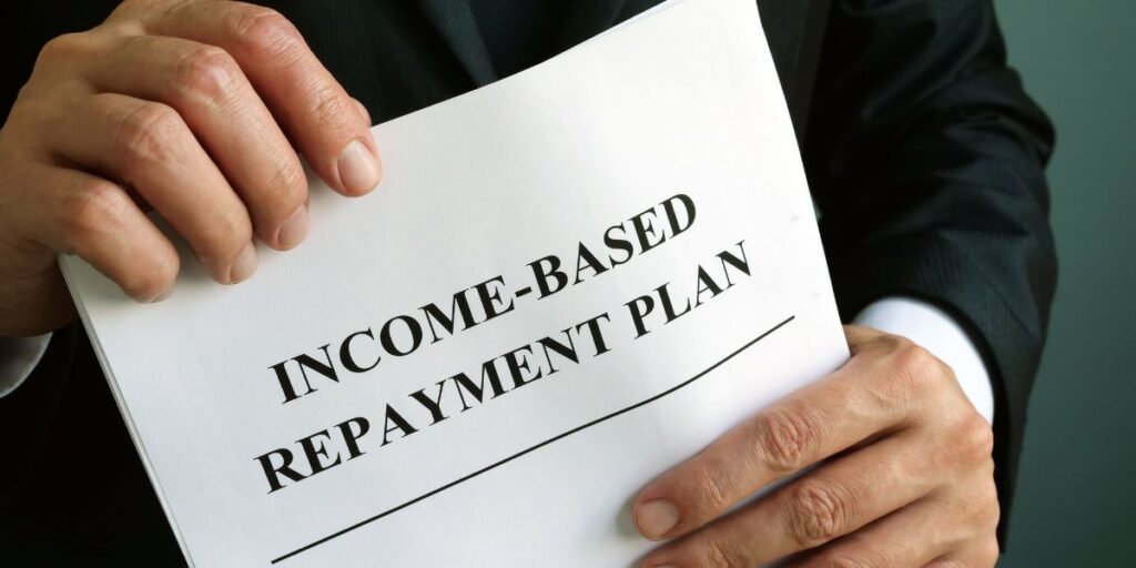 A person holding their income-driven repayment plan options