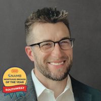 Nathan Jennison smiling in professional headshot wearing glasses and blazer, with 2023 NAMB Mortgage Broker of the Year Southwest badge displayed.